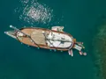 GREEN RAY Custom Gulet 28m - top aerial shot anchored with the water toys GREEN RAY Custom Gulet 28m - top aerial shot anchored with the water toys