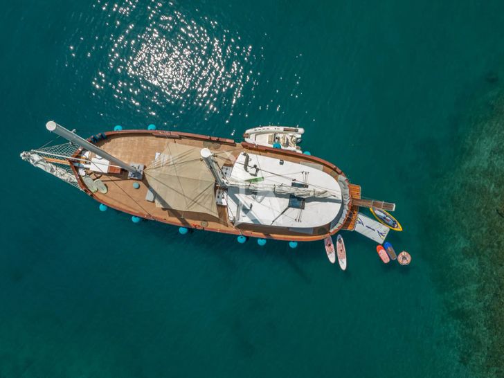 GREEN RAY Custom Gulet 28m - top aerial shot anchored with the water toys GREEN RAY Custom Gulet 28m - top aerial shot anchored with the water toys