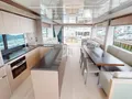 G.T.U. Sunseeker 76 - dining area and galley G.T.U. Sunseeker 76 - dining area and galley
