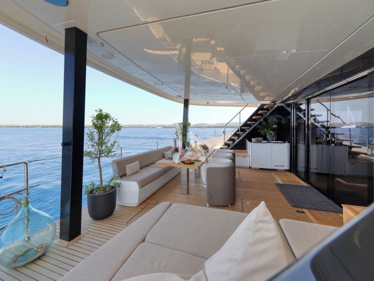 HONEYBIRD Sunreef 80 - aft deck alfresco dining area HONEYBIRD Sunreef 80 - aft deck alfresco dining area