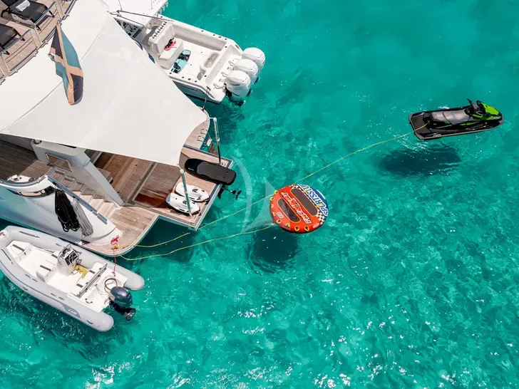 ISLAND COWBOY Ocean Alexander 37L - aft shot with the water toys ISLAND COWBOY Ocean Alexander 37L - aft shot with the water toys