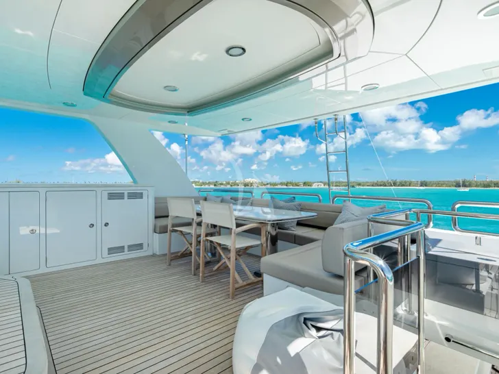 ISLAND COWBOY Ocean Alexander 37L - sundeck dining area ISLAND COWBOY Ocean Alexander 37L - sundeck dining area