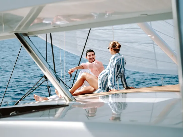 IL MIO CANTO LIBERO Nautor's Swan 105 - guests enjoying onboard IL MIO CANTO LIBERO Nautor's Swan 105 - guests enjoying onboard