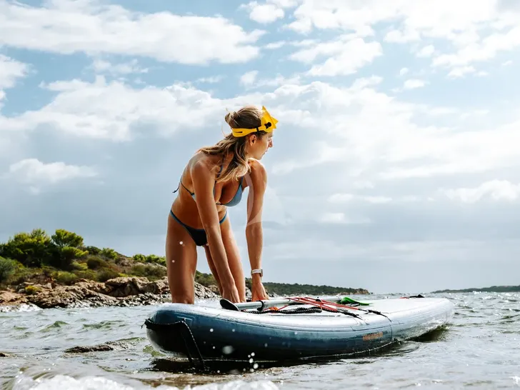 IL MIO CANTO LIBERO Nautor's Swan 105 - paddleboarding IL MIO CANTO LIBERO Nautor's Swan 105 - paddleboarding