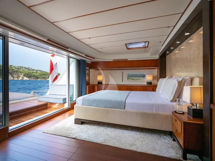 IL MIO CANTO LIBERO Nautor's Swan 105 - master cabin with view out unto aft deck IL MIO CANTO LIBERO Nautor's Swan 105 - master cabin with view out unto aft deck