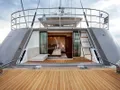 IL MIO CANTO LIBERO Nautor's Swan 105 - view into master cabin from the aft swim platform IL MIO CANTO LIBERO Nautor's Swan 105 - view into master cabin from the aft swim platform