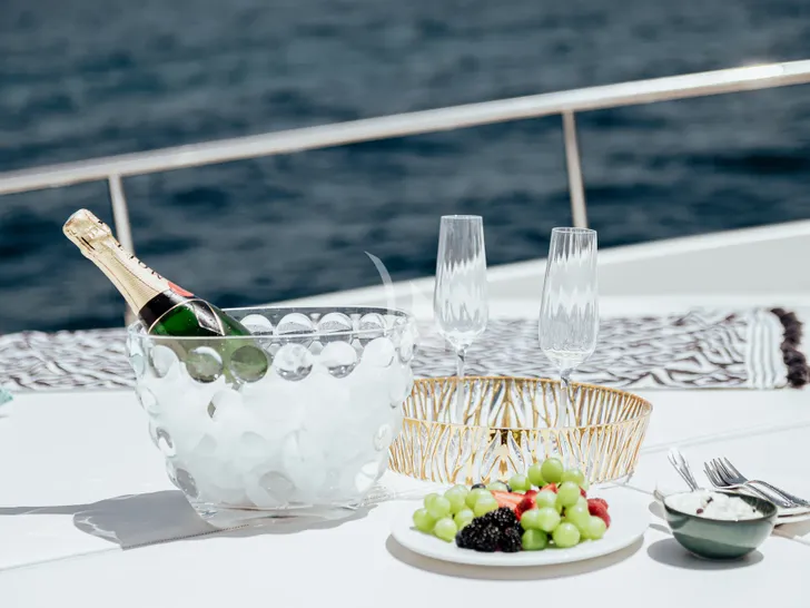 IRENE Ferretti 780 - wine on the foredeck IRENE Ferretti 780 - wine on the foredeck