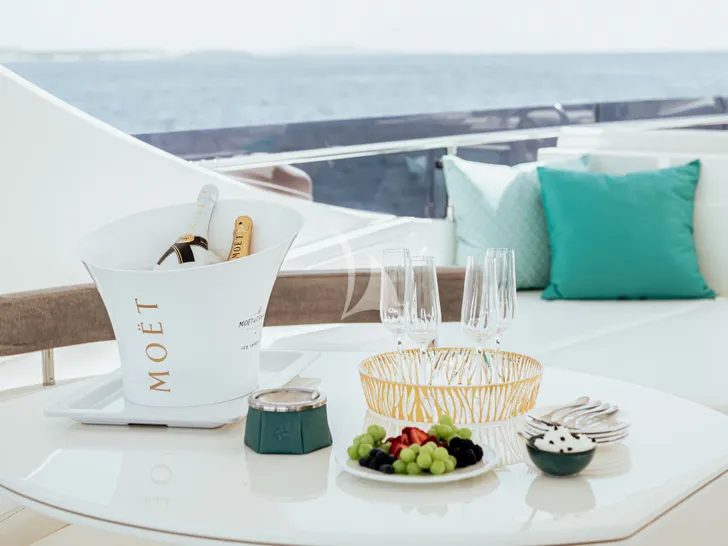 IRENE Ferretti 780 - wine on the sundeck IRENE Ferretti 780 - wine on the sundeck