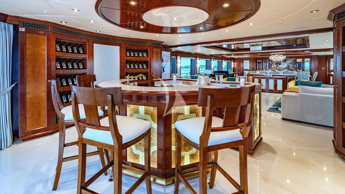 IRON BLONDE Trinity Yacht 60m - main salon bar and wine cellar