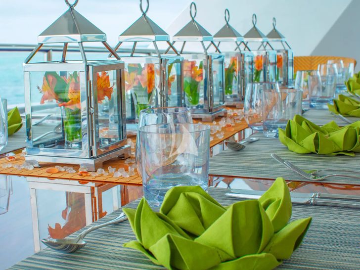 ISLAND HEIRESS Cheoy Lee 145 - artistic dining set up ISLAND HEIRESS Cheoy Lee 145 - artistic dining set up