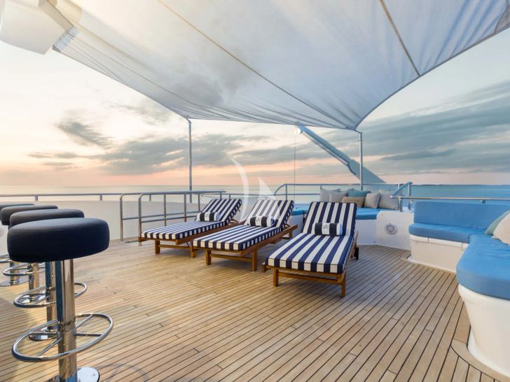 ISLAND HEIRESS Cheoy Lee 145 - sundeck sunbathing area and bar seats ISLAND HEIRESS Cheoy Lee 145 - sundeck sunbathing area and bar seats