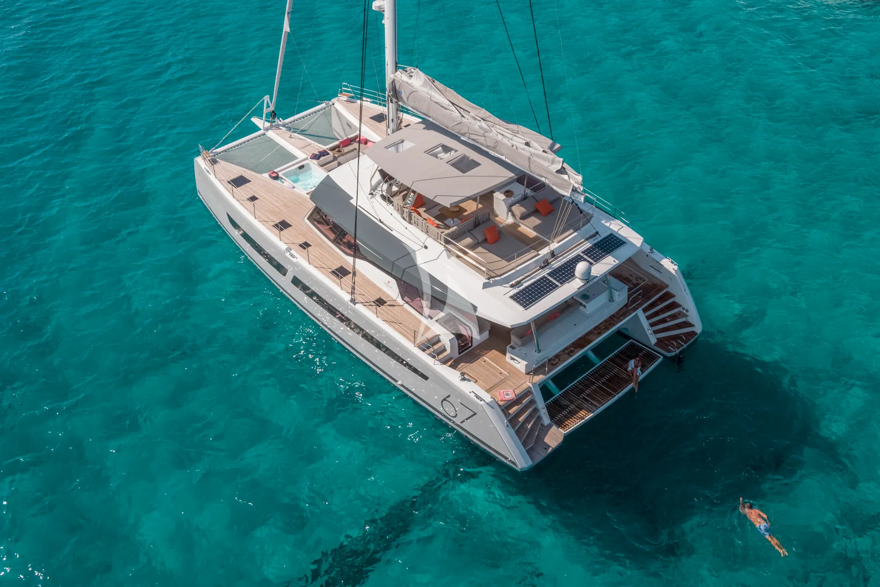 ISOLA Fountaine Pajot Alegria 67 - anchored aerial shot