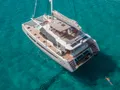 ISOLA Fountaine Pajot Alegria 67 - anchored aerial shot ISOLA Fountaine Pajot Alegria 67 - anchored aerial shot