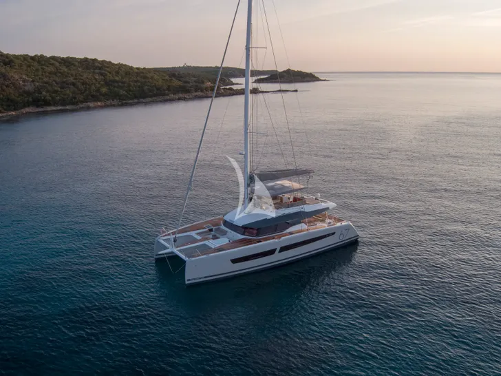 ISOLA Fountaine Pajot Alegria 67 - anchored under the sunset ISOLA Fountaine Pajot Alegria 67 - anchored under the sunset