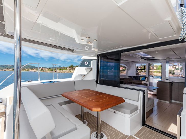 JANI Leopard 42 - aft deck lounge and dining area JANI Leopard 42 - aft deck lounge and dining area