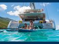 JEWEL Fountaine Pajot Alegria 67 aft shot with water toys