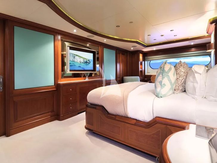 JO I Benetti Golden Bay 50m - master cabin bed and TV JO I Benetti Golden Bay 50m - master cabin bed and TV