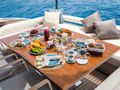 KAR Riva Folgore 88 - aft deck dining set up KAR Riva Folgore 88 - aft deck dining set up