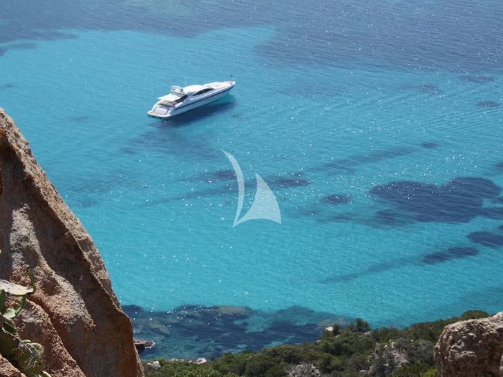 KAWAI Mangusta 92 - anchored near an island KAWAI Mangusta 92 - anchored near an island