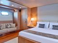KINTARO Cantieri di Pisa Akhir 125 - master cabin bed and seating KINTARO Cantieri di Pisa Akhir 125 - master cabin bed and seating