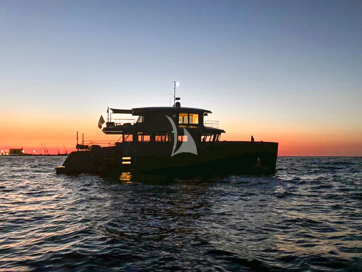 KOKONUT`S WALLY Wally 86 - anchored under the sunset KOKONUT`S WALLY Wally 86 - anchored under the sunset