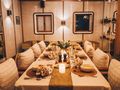 KUDANIL Custom Motor Yacht 50m - indoor dining set up KUDANIL Custom Motor Yacht 50m - indoor dining set up