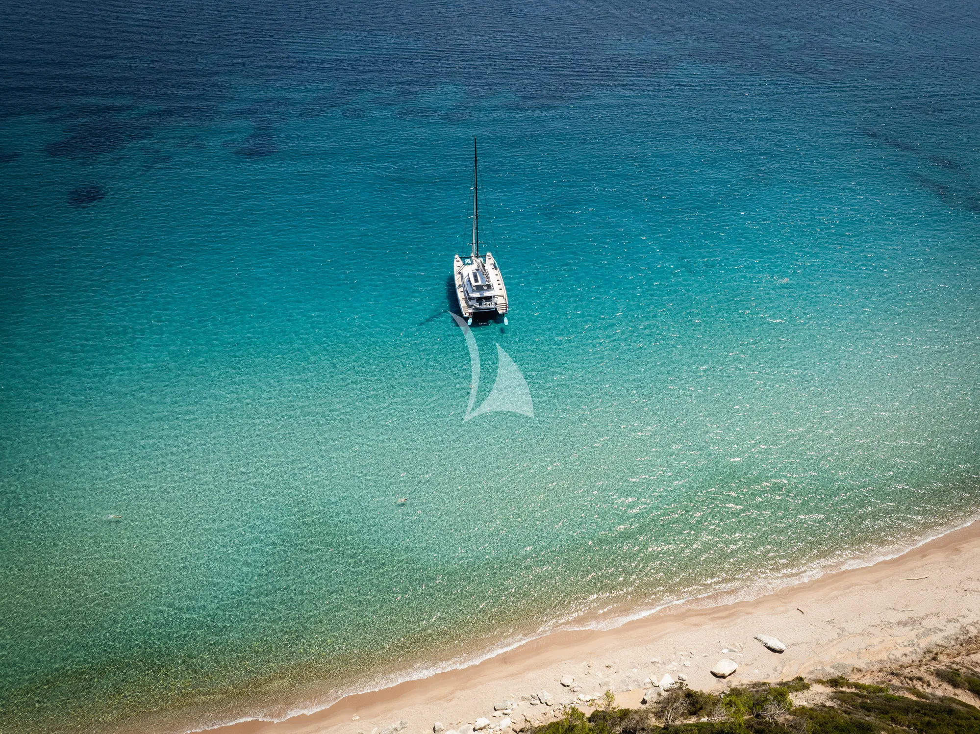 LA DESIRADE Lagoon Seventy 7 - drone shot while anchored by the beach