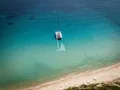 LA DESIRADE Lagoon Seventy 7 - drone shot while anchored by the beach LA DESIRADE Lagoon Seventy 7 - drone shot while anchored by the beach