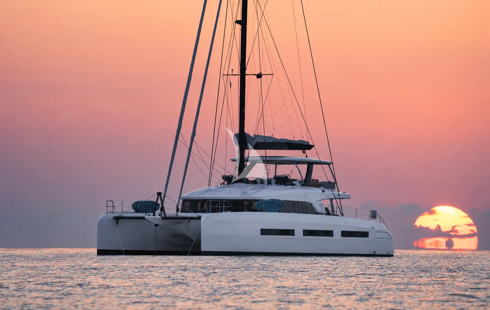 LA DESIRADE Lagoon Seventy 7 - profile against the sunset