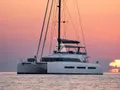 LA DESIRADE Lagoon Seventy 7 - profile against the sunset LA DESIRADE Lagoon Seventy 7 - profile against the sunset