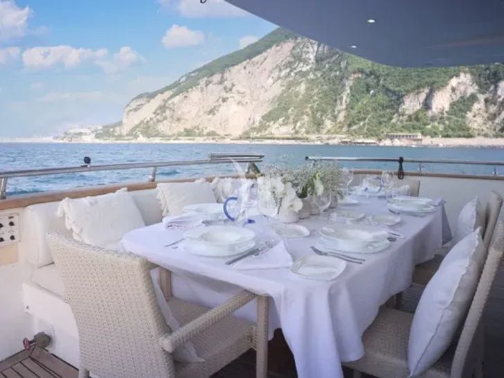 LADY A Maiora 30m - aft deck dining set up LADY A Maiora 30m - aft deck dining set up