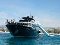 LADY AMANDA Guy Couach 30m - front view of motor yacht with water slide LADY AMANDA Guy Couach 30m - front view of motor yacht with water slide