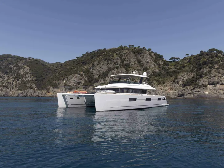 LADY C Lagoon 630 - anchored near an island LADY C Lagoon 630 - anchored near an island