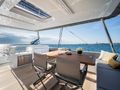 LADY M Lagoon 60 - flybridge dining area LADY M Lagoon 60 - flybridge dining area