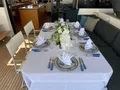LA FREGATE Lagoon 630 - aft deck dining set up LA FREGATE Lagoon 630 - aft deck dining set up