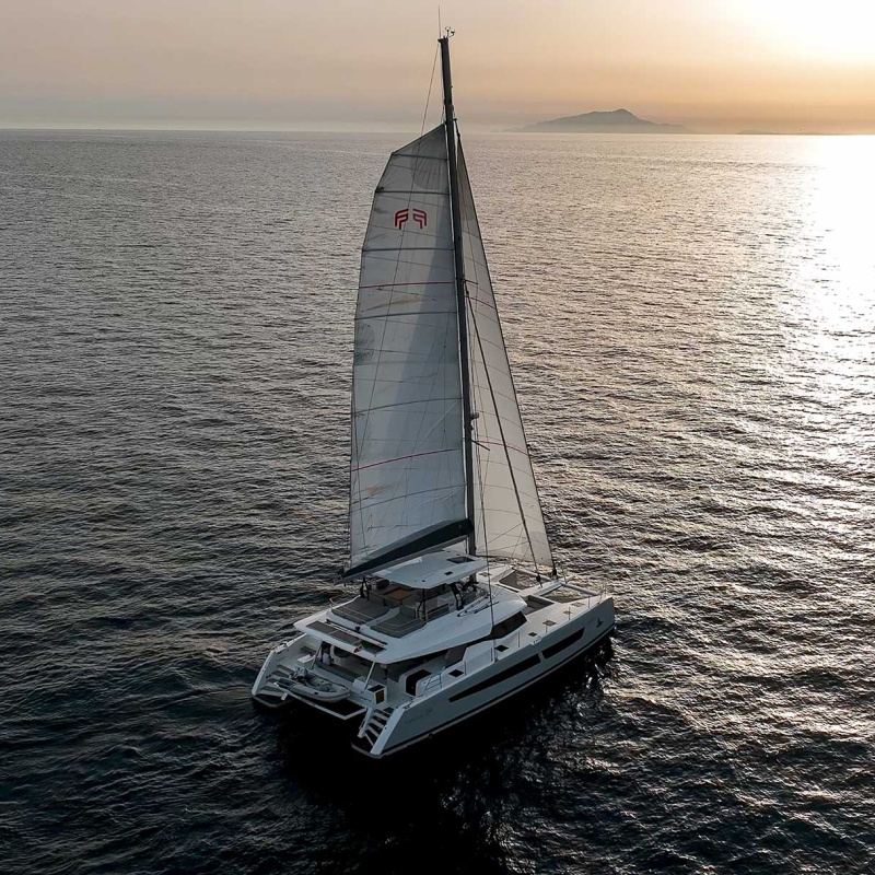 LIBERTA Fountaine Pajot Samana 59 - aerial shot sailing under the sunset