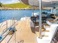 LINDA Lagoon 60 - aft deck alfresco dining lounge and amenities LINDA Lagoon 60 - aft deck alfresco dining lounge and amenities