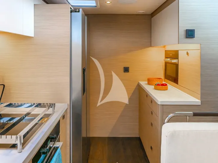 LINDA Lagoon 60 - galley refrigerator and cooking area LINDA Lagoon 60 - galley refrigerator and cooking area