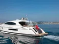 LIZZI Lazzara 75 cruising aft LIZZI Lazzara 75 cruising aft