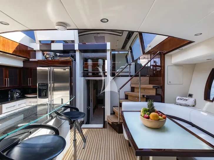 LIZZI Lazzara 75 dining and galley other angle LIZZI Lazzara 75 dining and galley other angle
