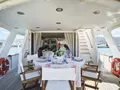 LIBERTY OF LONDON Custom Aluminum Cutter 24m - aft deck alfresco dining area LIBERTY OF LONDON Custom Aluminum Cutter 24m - aft deck alfresco dining area