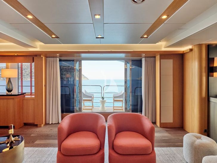 MAKANI II Predator 115 - salon seating with sea view balcony MAKANI II Predator 115 - salon seating with sea view balcony
