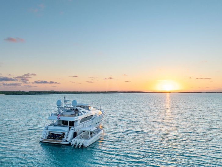 MAMBO Ferretti 112 - anchored under the sunset MAMBO Ferretti 112 - anchored under the sunset