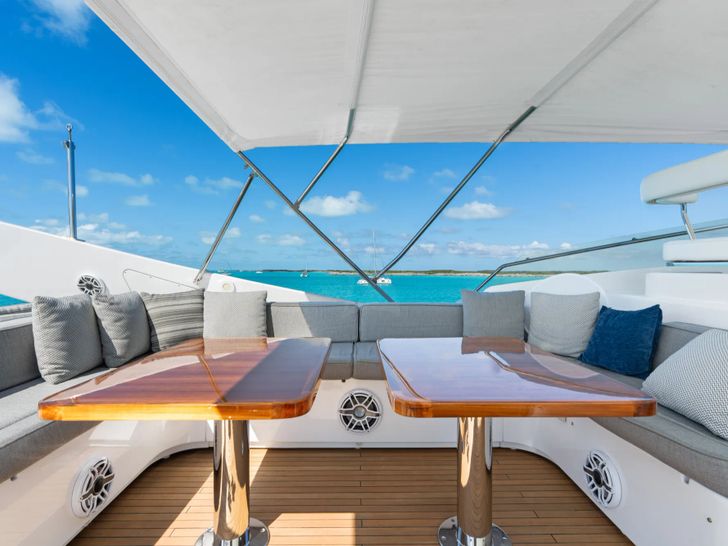 MAMBO Ferretti 112 - flybridge dining and seating area MAMBO Ferretti 112 - flybridge dining and seating area