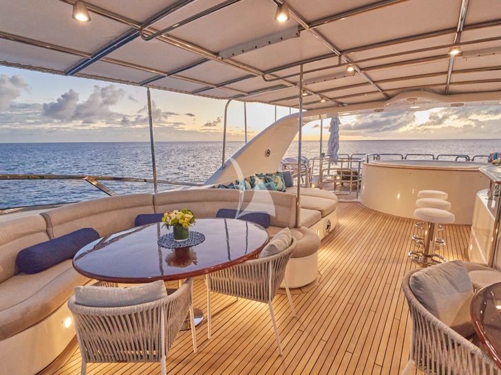 MAMMA MIA Benetti Classic 120 - sun deck seating and dining area MAMMA MIA Benetti Classic 120 - sun deck seating and dining area