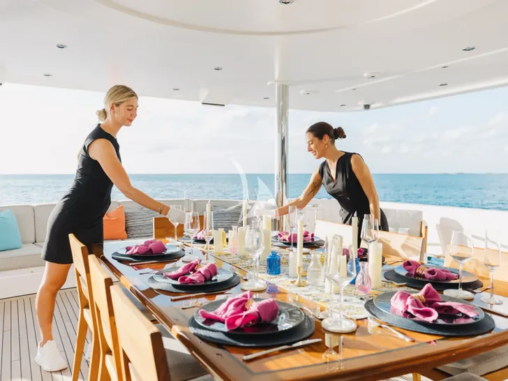 MEMENTO VIVERE Westport 130 - crew preparing for an alfresco dinner MEMENTO VIVERE Westport 130 - crew preparing for an alfresco dinner