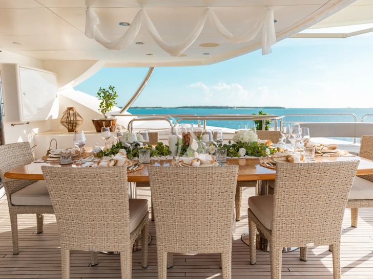 MERCY Sunseeker 121 Yacht - sky deck dining set up MERCY Sunseeker 121 Yacht - sky deck dining set up