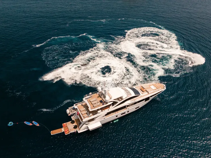 MIKOH Azimut Grande 35m - anchored aerial shot MIKOH Azimut Grande 35m - anchored aerial shot