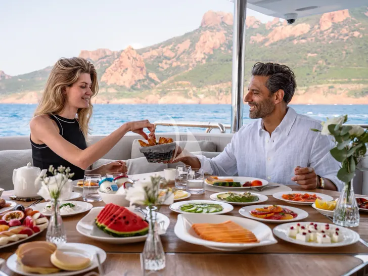 MIKOH Azimut Grande 35m - guests dining alfresco MIKOH Azimut Grande 35m - guests dining alfresco