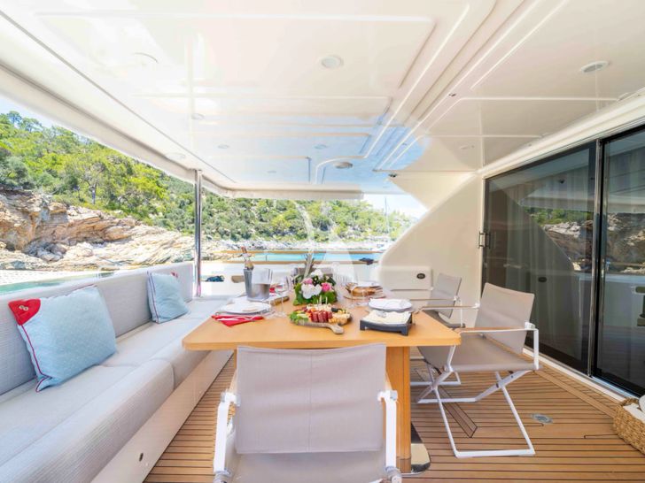 MILENA Custom Line Navetta 28 - main aft deck alfresco dining area MILENA Custom Line Navetta 28 - main aft deck alfresco dining area